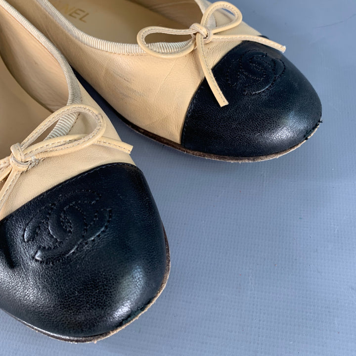 CHANEL Size 9 Beige Black Leather Monogram Cap Toe Flats