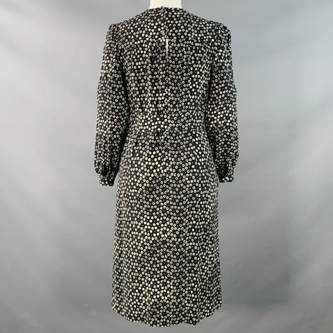 Robe A.P.C. taille 2 noire et blanche à motifs floraux, à manches longues, ceinturée, longueur genou