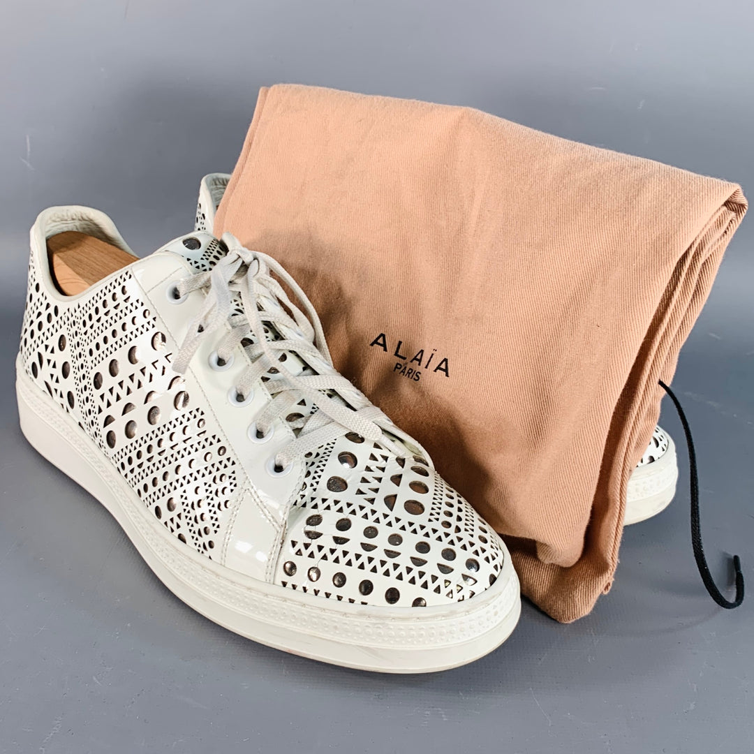ALAIA Size 9 White Silver Perforated Patent Leather Low Top Sneakers