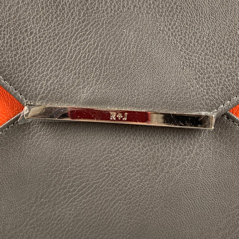 R+J Grey Orange Color Block Clutch Handbag