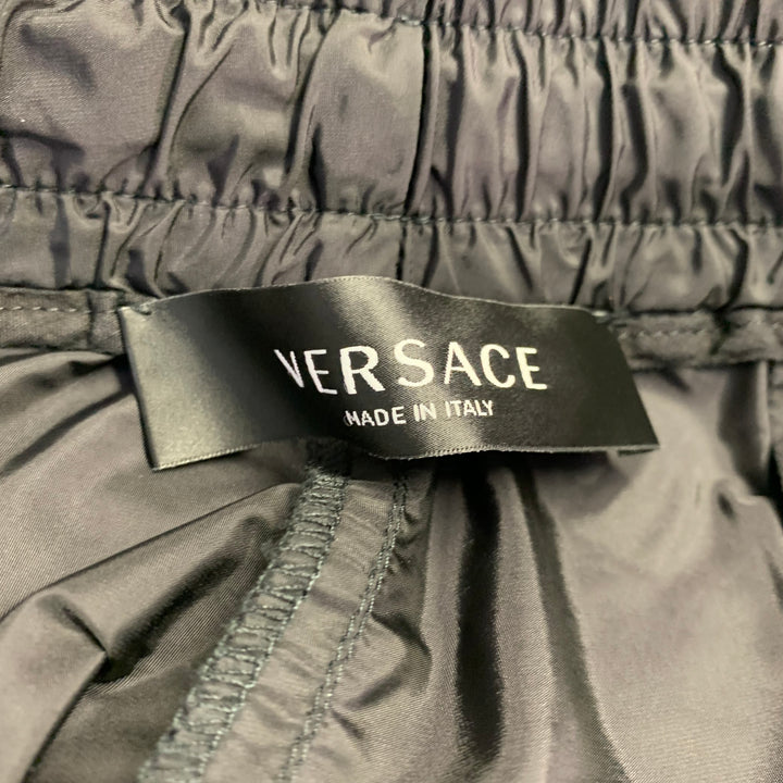 VERSACE Size 36 Black Blue Gold Vertical Stripe Nylon Sweatpants Casual Pants
