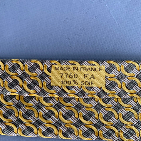 Cravate HERMÈS en soie motif ronds olive doré 7760FA