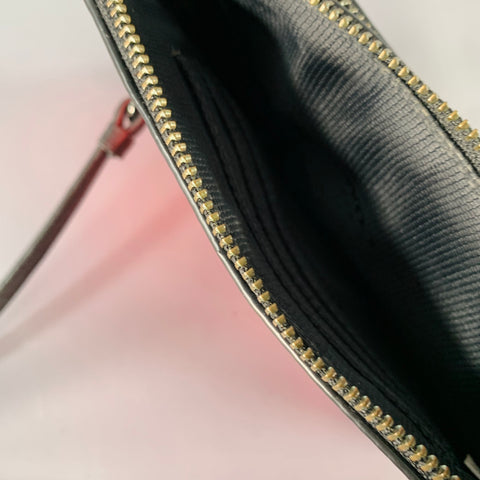 Portefeuille COACH zippé rouge et noir avec dragonne
