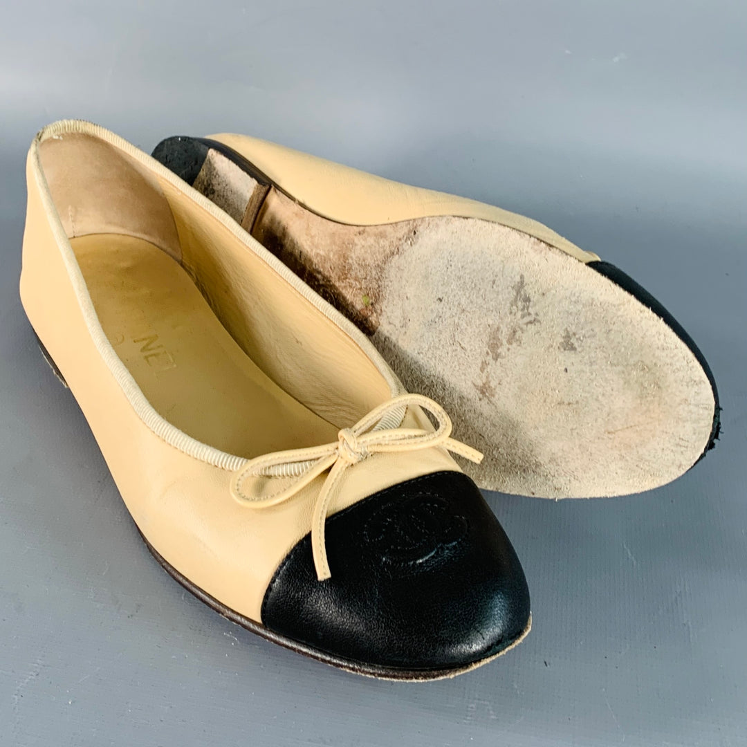 CHANEL Size 9 Beige Black Leather Monogram Cap Toe Flats