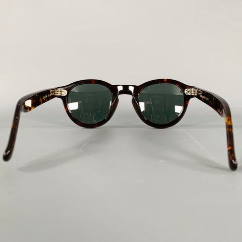 Lunettes de soleil LESCA en acétate écaille de tortue marron noir