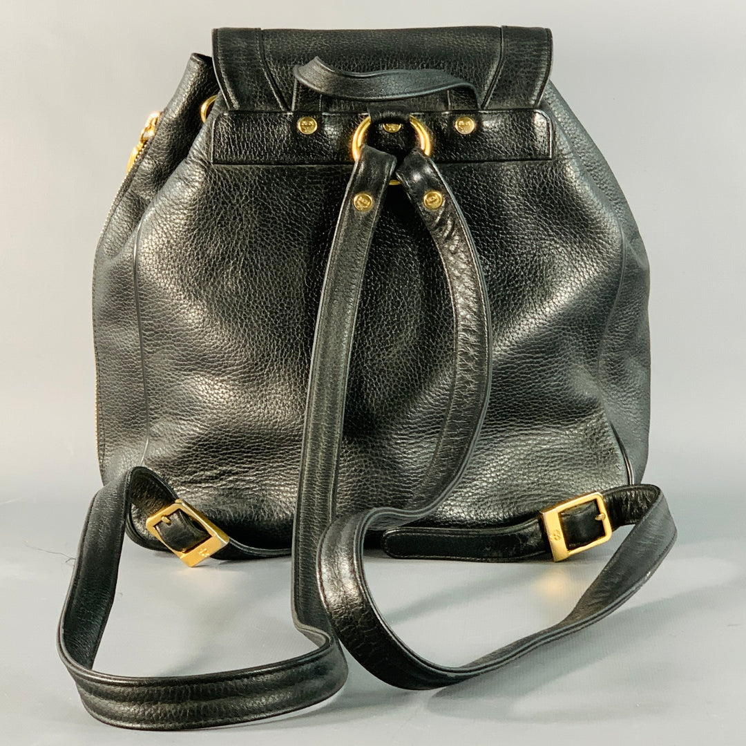 MCM Vintage Small Black Gold Leather Drawstring Backpack  display picture 1