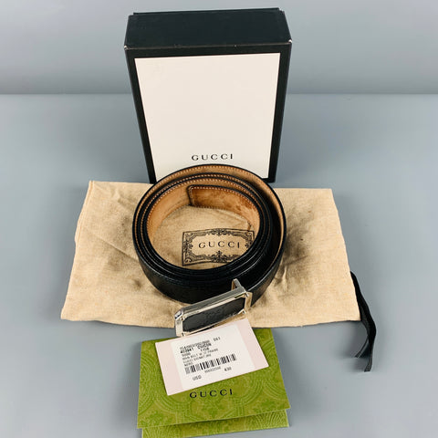 GUCCI Size 42 Black Silver Embossed Leather Belt