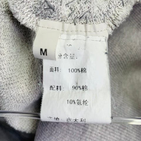 YVES SAINT LAURENT Taille M Sweat-shirt clouté vieilli en coton gris chiné