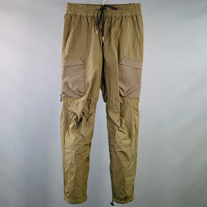 Pantalon décontracté John Elliott en nylon vert olive à cordon de serrage, taille 30