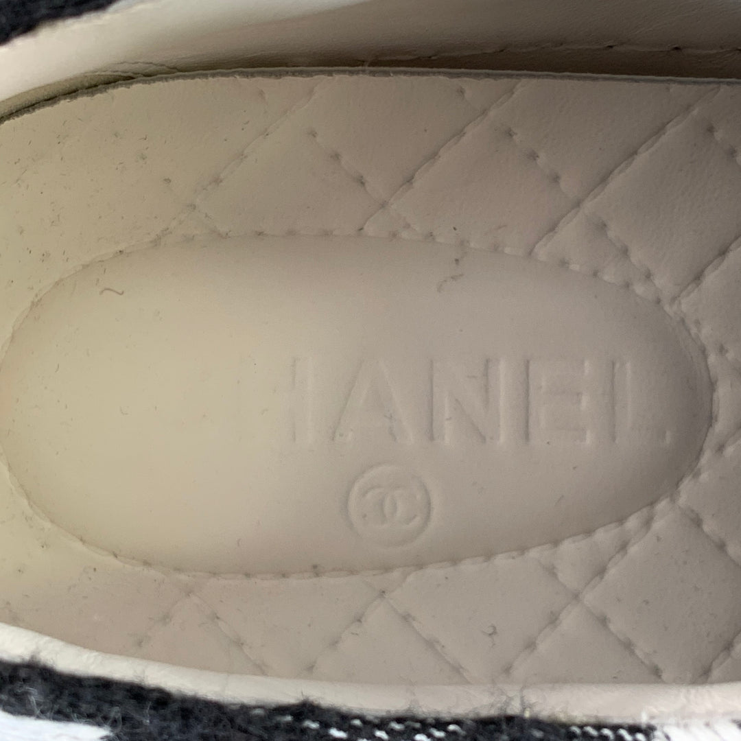 CHANEL Size 9 Black White Woven Canvas Slip On Lace-Up Sneakers