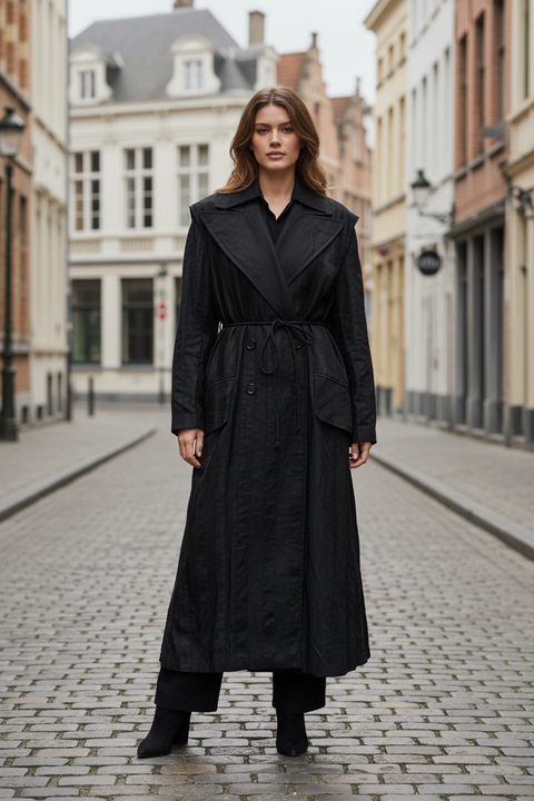 Black trench coat on a mannequin against a gray background