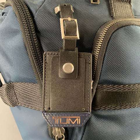 Sacs polochons en toile chinée noire bleu marine TUMI