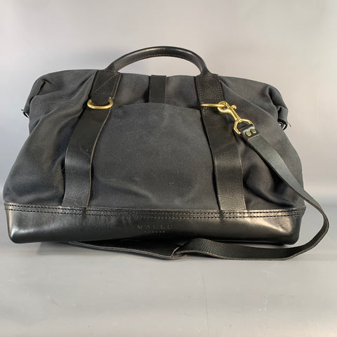 MALLE LONDON Sac à main en toile noire avec garniture en cuir