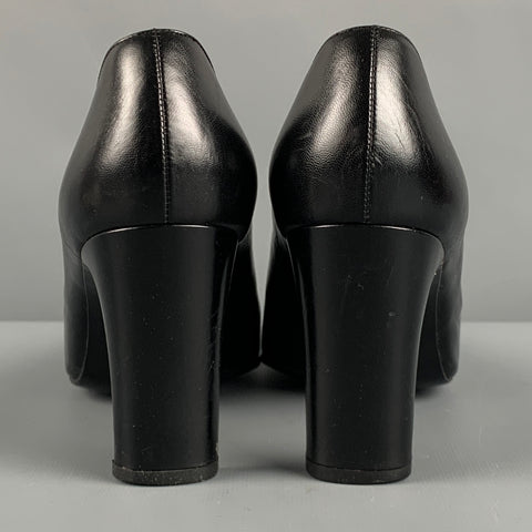 CHANEL Size 8 Black Leather Logo Classic Chunky Heel Pumps