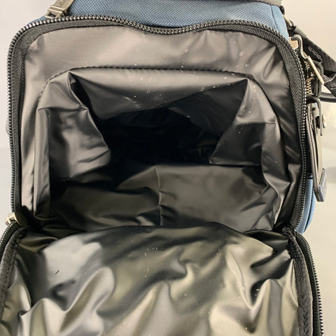Sacs polochons en toile chinée noire bleu marine TUMI