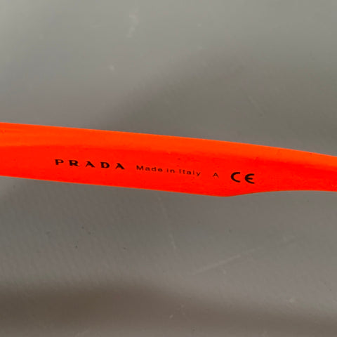 PRADA Lunettes de soleil Aviateur en métal noir et rouge