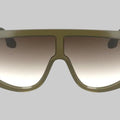 Sunglasses with a green frame and gradient lenses on a white background