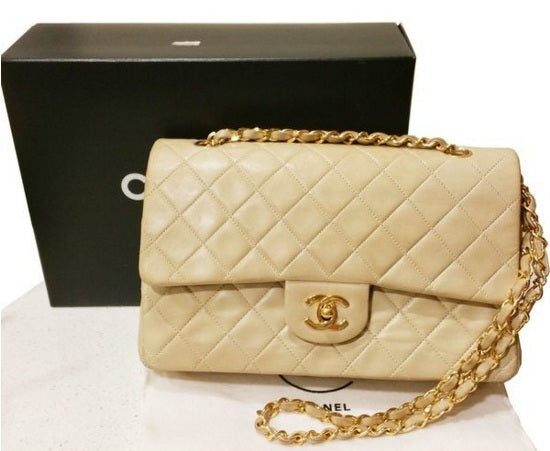 Photographic reference example of a Chanel classic double-flap style handbag; exact materials, hardware and seasonal details vary