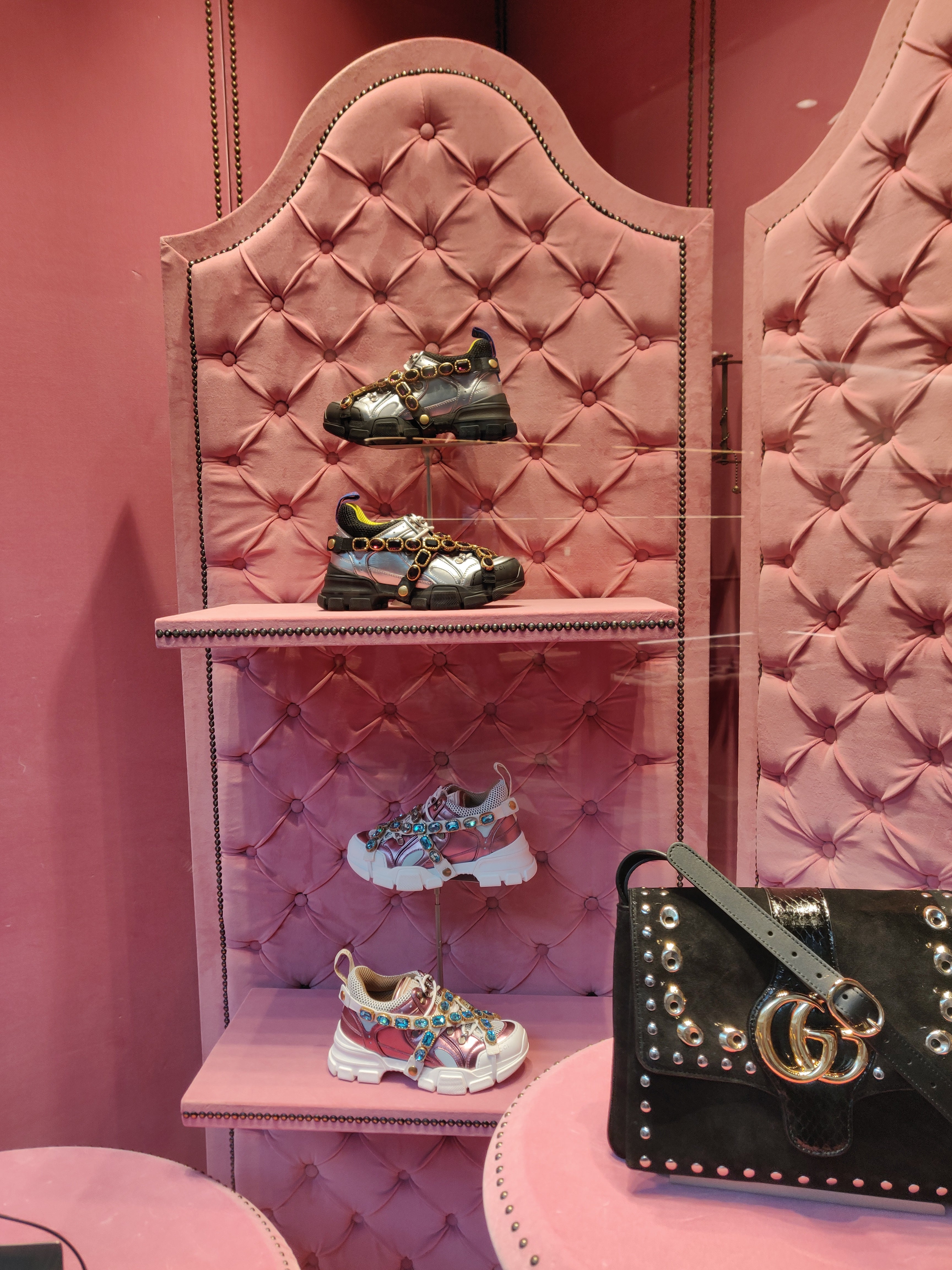 Gucci sneakers in a retail display
