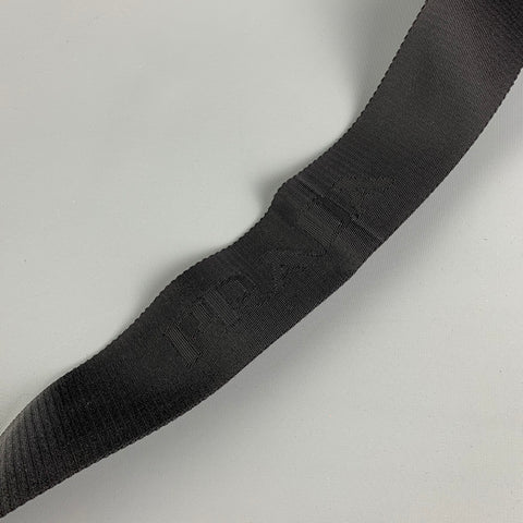 PRADA Sac bandoulière en nylon noir avec bordure en cuir