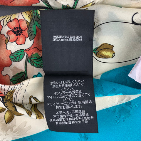 GUCCI Ascot à bordure turquoise en soie florale multicolore