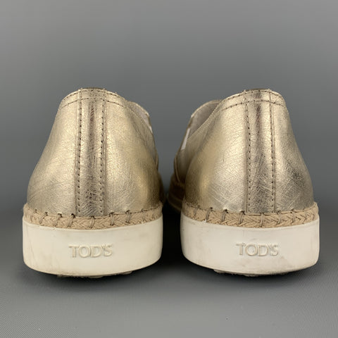 Zapatos planos sin cordones de cuero dorado talla 7.5 de TOD'S