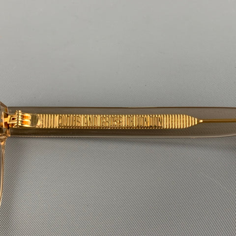 CUTLER AND GROSS Clear Gold Acetate Sunglasses