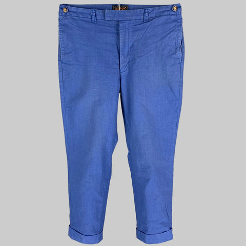 A pair of BEAMS brand casual pants in blue color, made of cotton and polyurethane, displayed on a plain background.