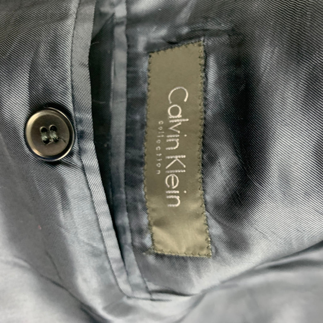 COLECCIÓN CALVIN KLEIN Talla 36 Traje azul marino con solapa de pico de lana a cuadros