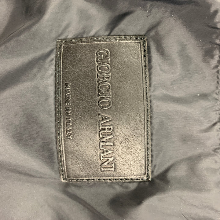 GIORGIO ARMANI Taille 46 Manteau de sport en polyamide tricoté gaufré noir