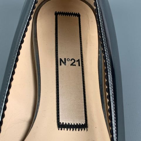 Nº21 Zapatos planos con punta en punta de cuero plateado talla 7