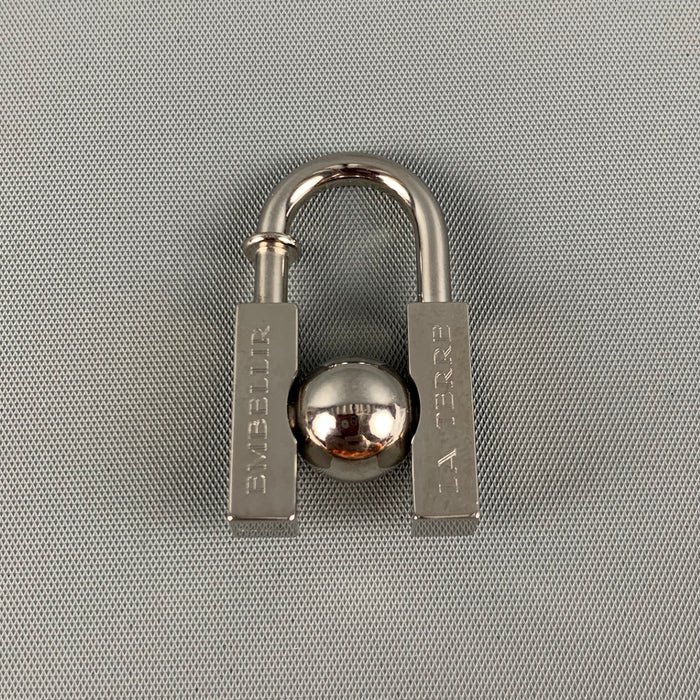 HERMES Silver Metal Bag L'HOMME PEUT EMBELLIR LA TERRE 2001 Charm