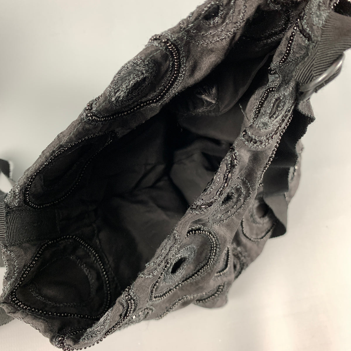 Additional Sui Generis archive reference view of the same Ann Demeulemeester handbag, SKU 128418.