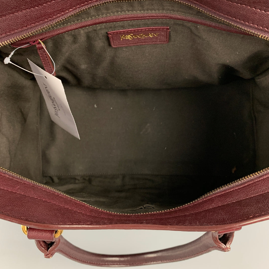 YVES SAINT LAURENT 2012 CABAS Bolso de cuero color burdeos con herrajes dorados