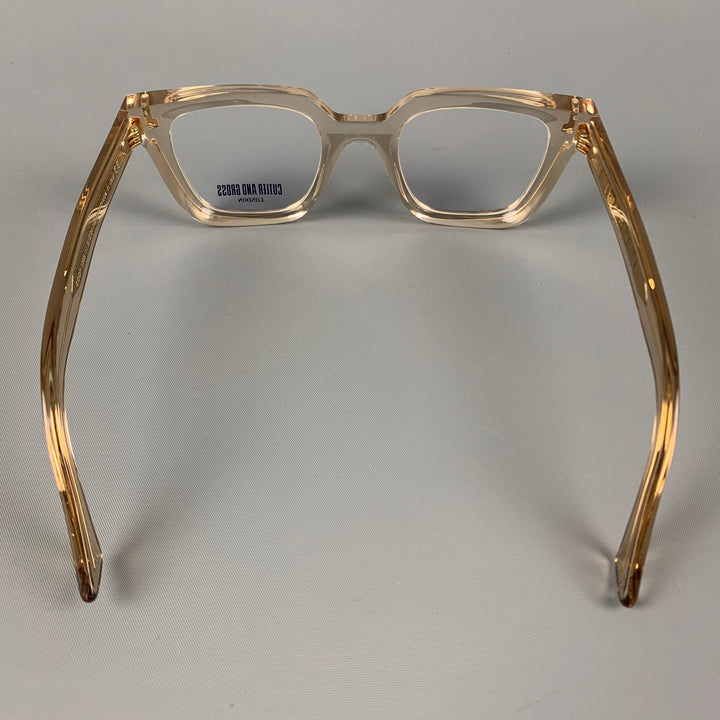 CUTLER AND GROSS Clear Gold Acetate Sunglasses