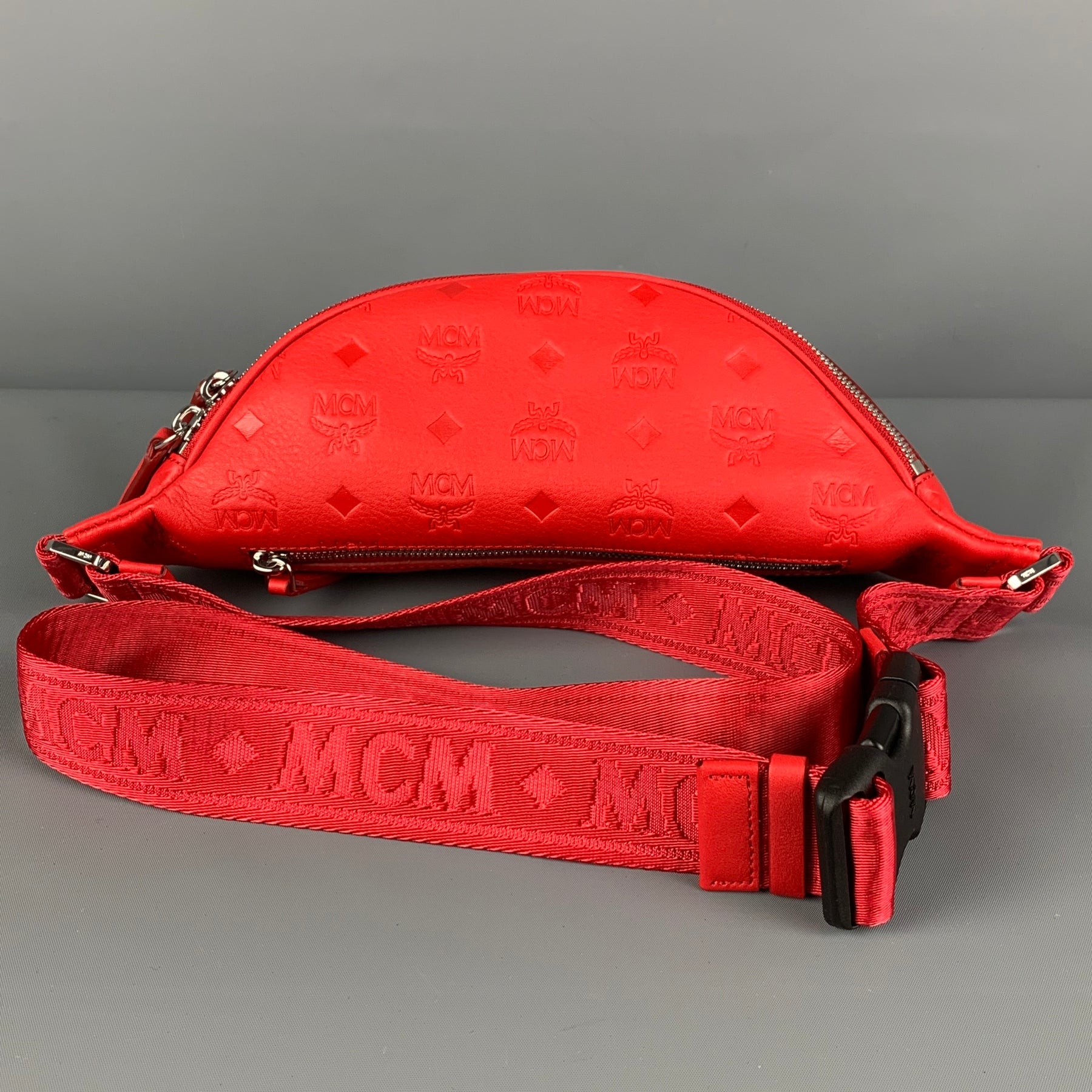 MCM Red Embossed Monogram Leather Belt Bag Sui Generis Designer Consignment