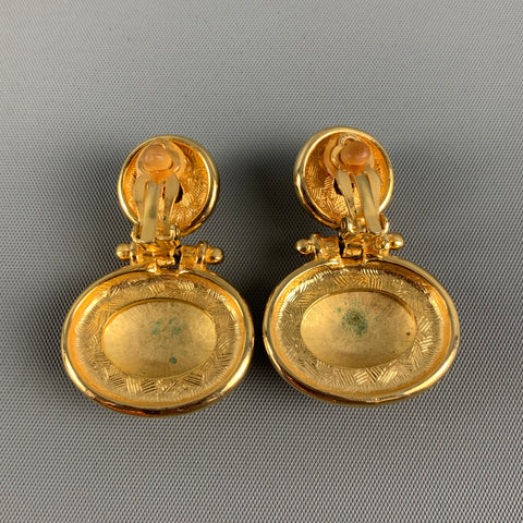 Boucles d'oreilles soleil clipsables en métal orange doré VINTAGE