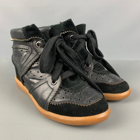ISABEL MARANT Zapatillas de deporte con cuña perforada de cuero negro talla 7