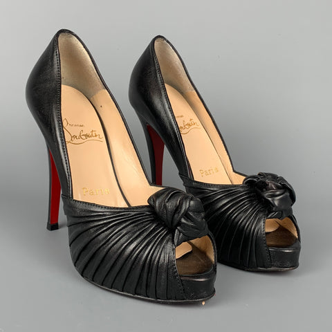 CHRISTIAN LOUBOUTIN Jenny Talla 6.5 Zapatos de tacón peep toe con nudo de cuero negro
