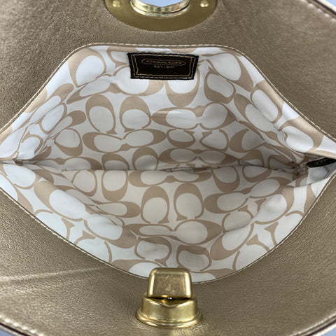 COACH Pochette en cuir doré