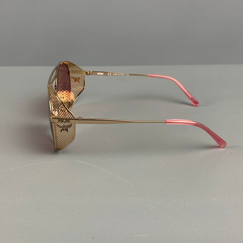 Lunettes de soleil en métal rose doré MCM