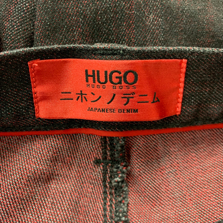 HUGO BOSS Talla 32 Vaqueros de poliuretano de algodón negro burdeos