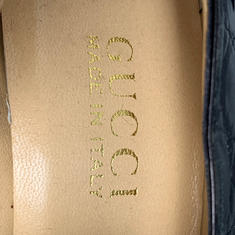 GUCCI Size 7.5 Black Gold Leather Embossed Pointed Toe Pumps