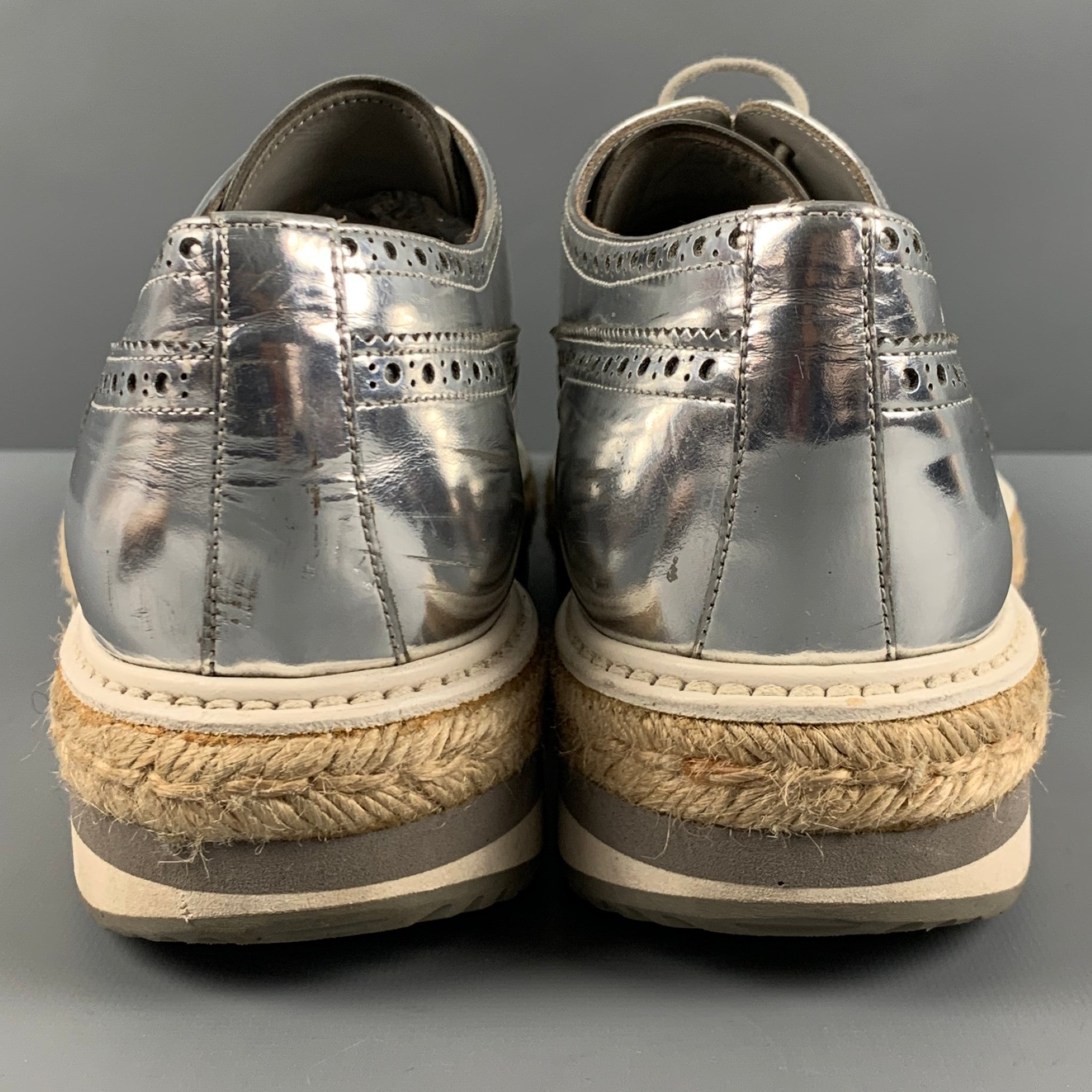 PRADA Size 10 Silver Perforated Leather Platform Lace-Up Shoes