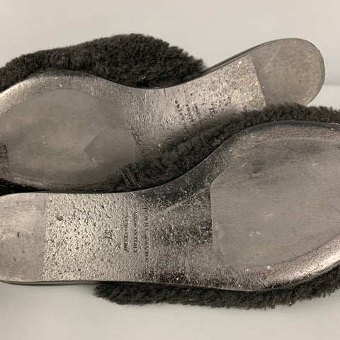 JENNI KAYNE Mules planos de piel de oveja negra talla 7