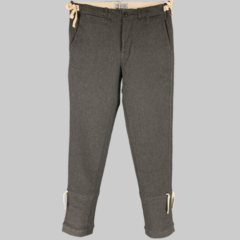 A pair of KENNETH FIELD casual pants in gray, featuring narrow leg design, adjustable side tie details, and a zip fly closure.