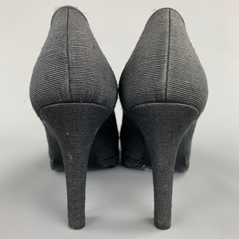 YVES SAINT LAURENT Zapatos de tacón con plataforma de tela texturizada negra talla 7