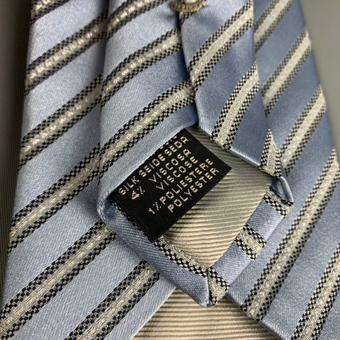 ERMENEGILDO ZEGNA Corbata en mezcla de seda con rayas diagonales plateadas azul claro