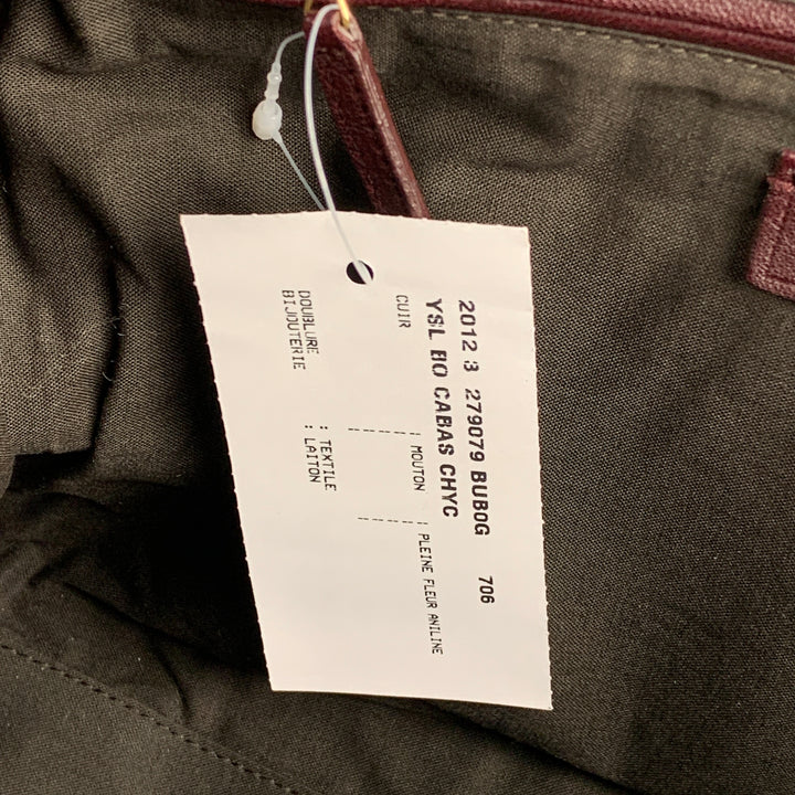 YVES SAINT LAURENT 2012 CABAS Bolso de cuero color burdeos con herrajes dorados