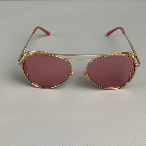 Lunettes de soleil en métal rose doré MCM